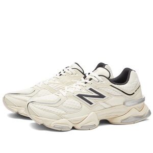 New Balance Cream and Black Sneakers